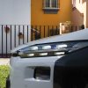 close up van subaru solterra links voor met uitgesproken 6-hexagonaal led koplampen